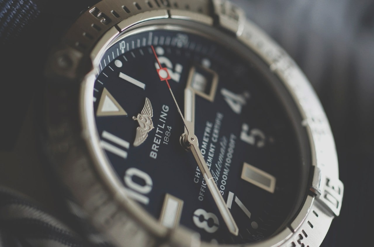 A close-up of a sporty Breitling watch.