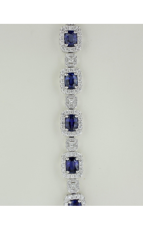 18KWG SECTIONAL 4.81CT DIAMOND AND SAPPHIRE BRACELET WITH 10.75CT OVAL SAPPHIRES SURROUNDED BY A RE