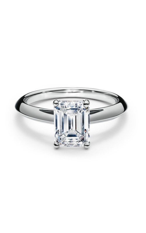 PLATINUM 0.78CT EMERALD CUT TIFFANY SOLITAIRE RING WITH A 4 PRONG BASKET SET CENTER BETWEEN RAISED S