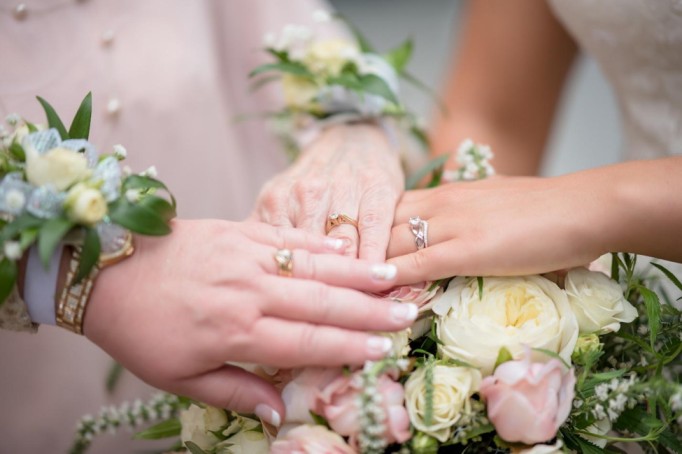 Three ladies show off their engagement rings